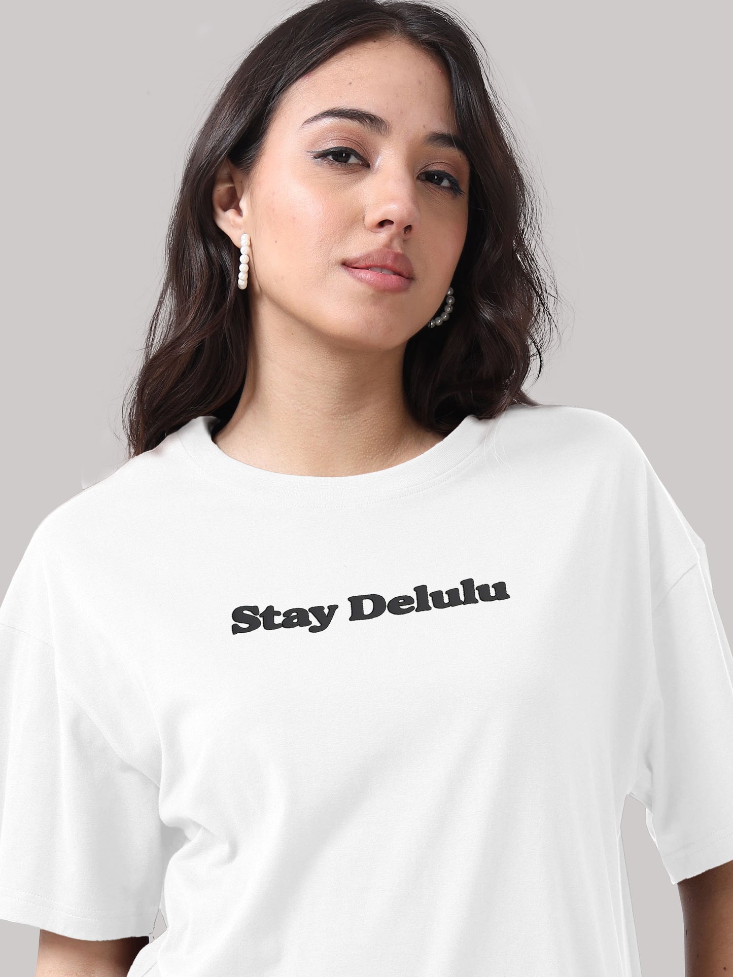 Women’s Oversized White Tshirt – Stay Delulu Graphic Tee